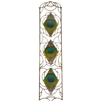 A wall hanging created with peacock feathers encased in diamond shaped glass embraced within intricate metalwork in the spirit of Art Nouveau.
